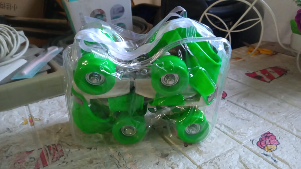 Wukusy kids' adjustable roller skates with comfortable padded boots and four wheels, perfect for beginner skating.