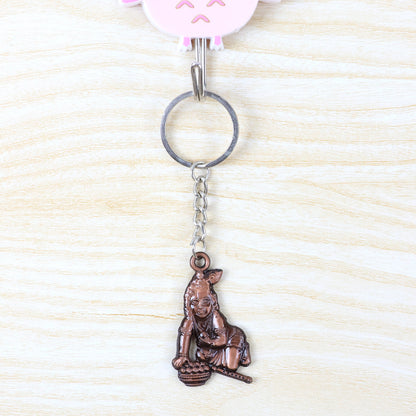 Wukusy Bal Krishna crawling design keychain with detailed colorful figure on a metal keyring.