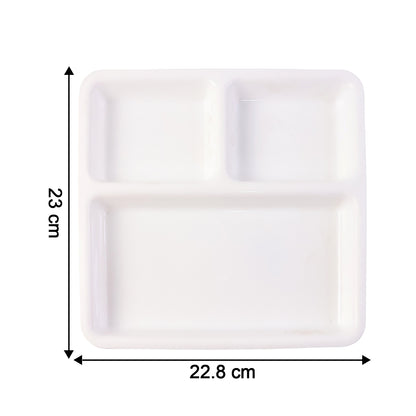 Wukusy plastic 3-compartment plate for meal serving, featuring separate sections for food, with a white and clear design.