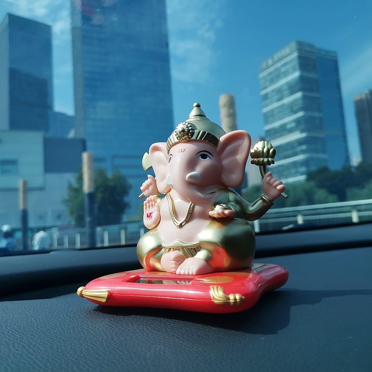 Solar-powered Dancing Ganesha idol decorative Lord Ganpati showpiece with moving features, ideal for home decor, by Wukusy.