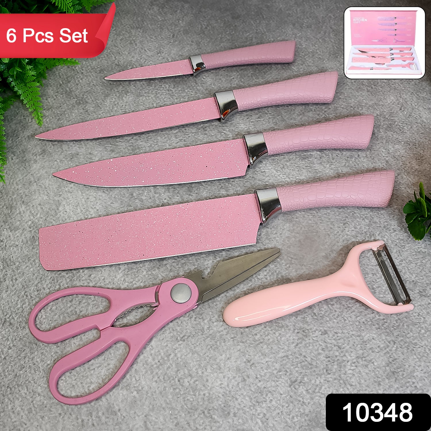 Wukusy 6-piece stainless steel kitchen knife set with ceramic coating, including scissors and peeler, on a kitchen countertop.