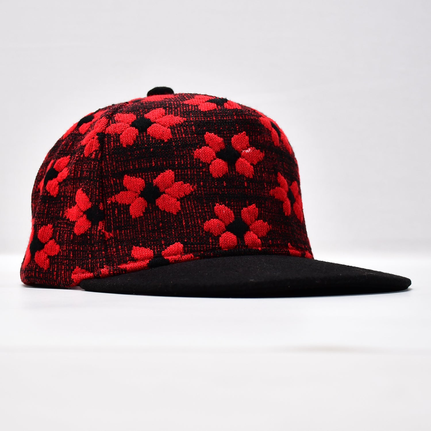Wukusy classic snap back hat cap in hip hop style, featuring a structured design with adjustable strap and bold branding.