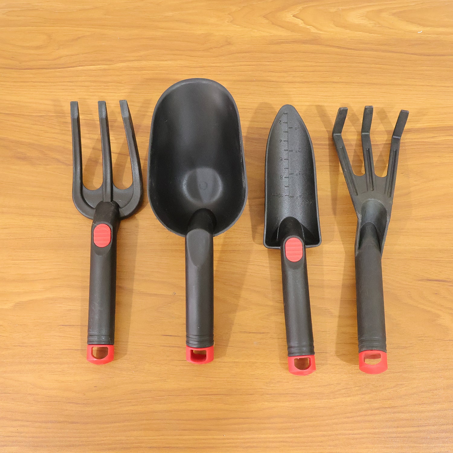 Wukusy 4-piece garden hand tool set including trowel, transplanter, weeder, and cultivator with wooden handles and metal tips.