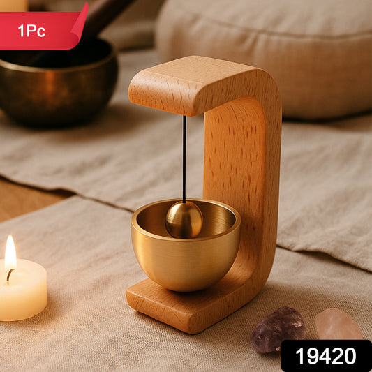 Wukusy Premium Desktop Japanese-style Zen Bell with wooden striker and intricate metal design on a wooden base.
