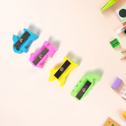 Cute plastic pencil sharpener in mixed colors with a small, compact design, ideal for office or school use.