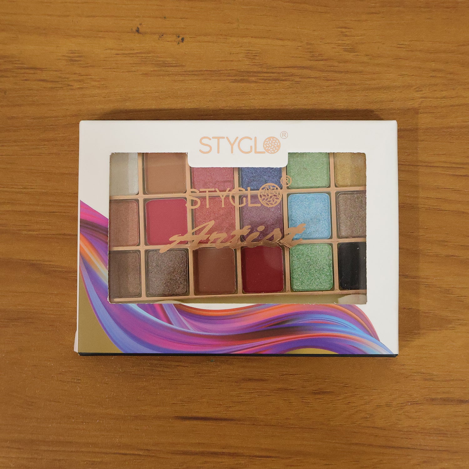 Wukusy 18-color eyeshadow makeup palette with a variety of vibrant shades and neutral tones for versatile eye looks.