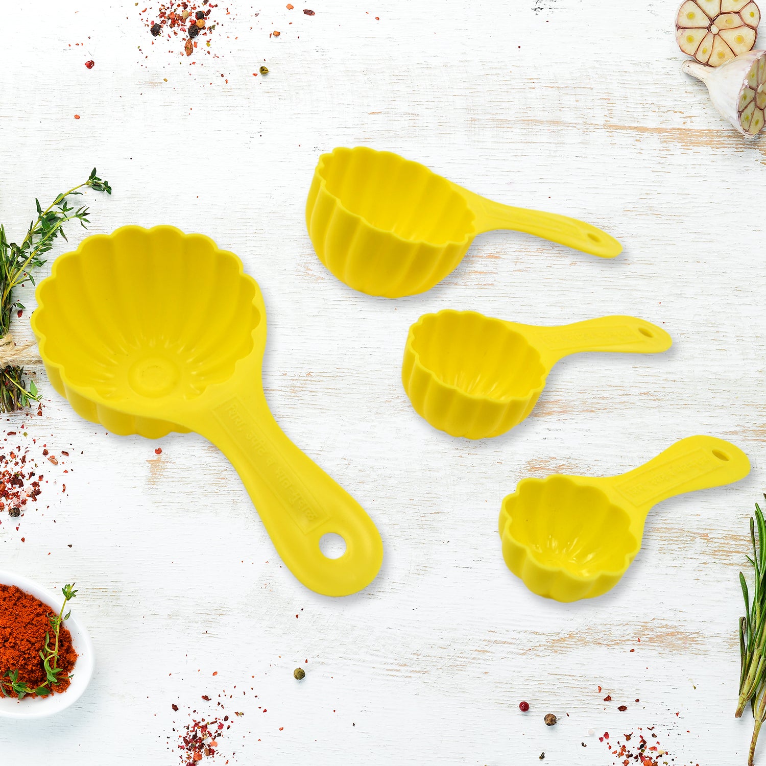 Wukusy plastic kitchen ladoo mould set with 4 pieces, including laddoo making spoons for versatile home baking and cooking.