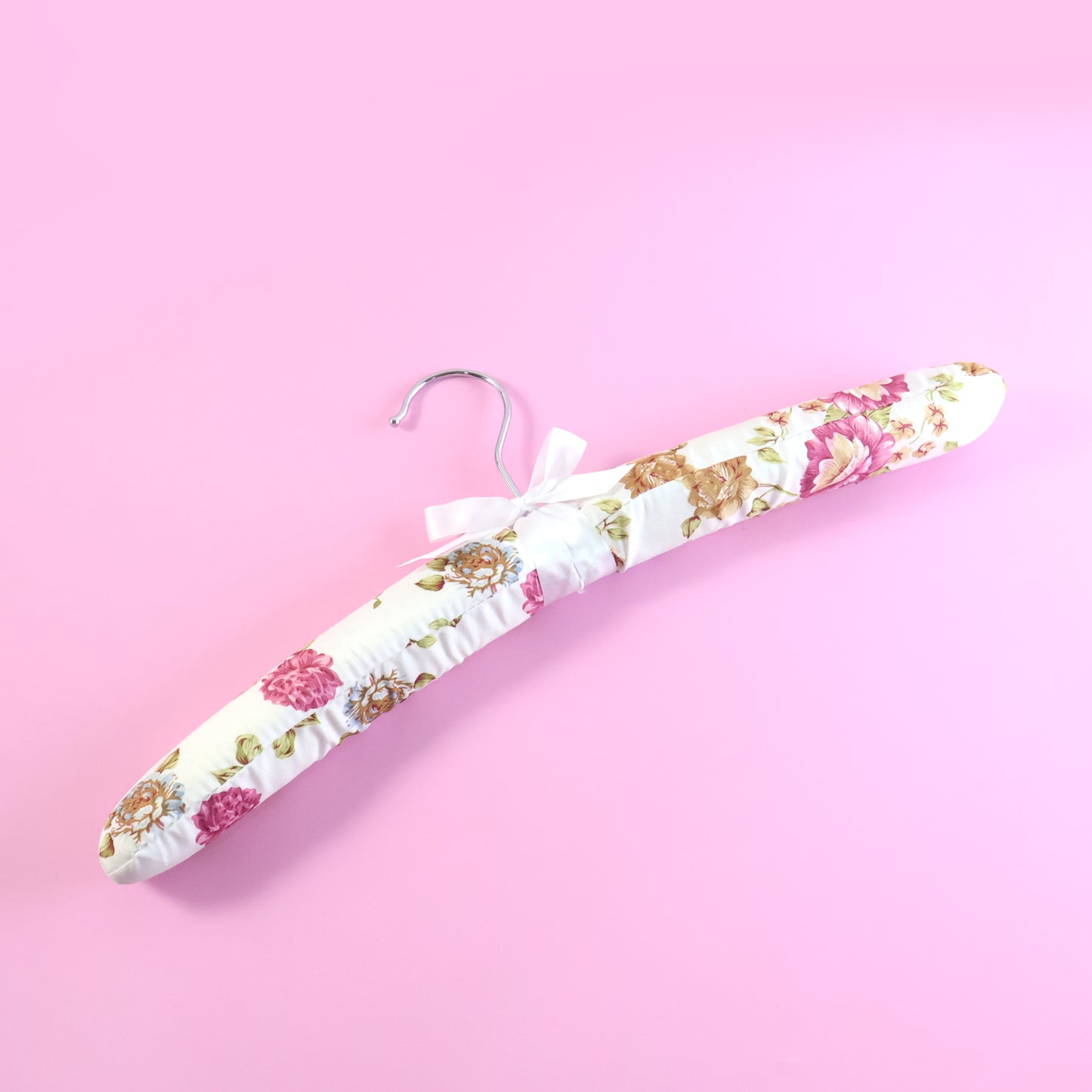Wukusy premium padded floral clothes hanger with floral design, sturdy padding, and smooth finish for delicate garments.