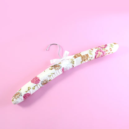 Wukusy premium padded floral clothes hanger with floral design, sturdy padding, and smooth finish for delicate garments.