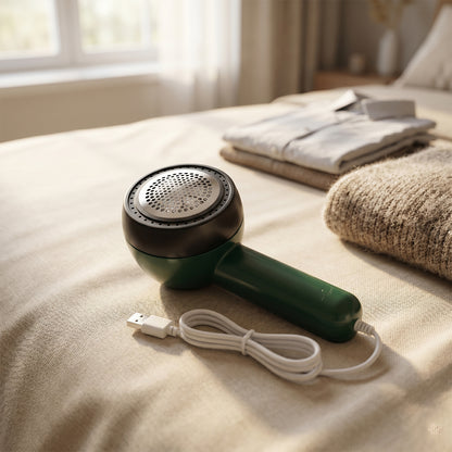 Wukusy electric lint remover with brush, handheld device for removing lint and fuzz from clothing and fabrics.