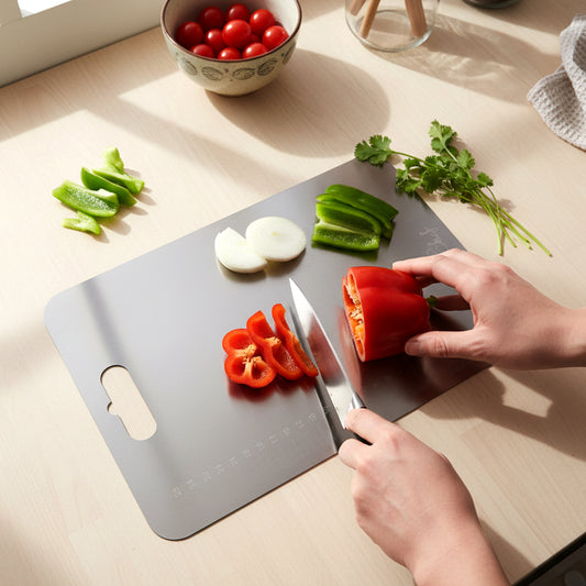 Large stainless steel chopping cutting board by Wukusy, showing a smooth, shiny surface ideal for food prep and chopping tasks.