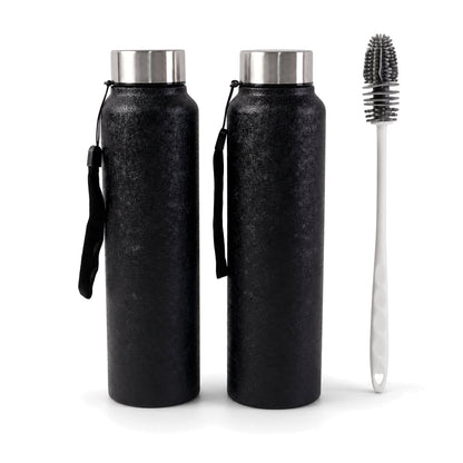 Stainless steel Wukusy water bottle with free cleaning brush, shown with lid and sleek design on a neutral background.