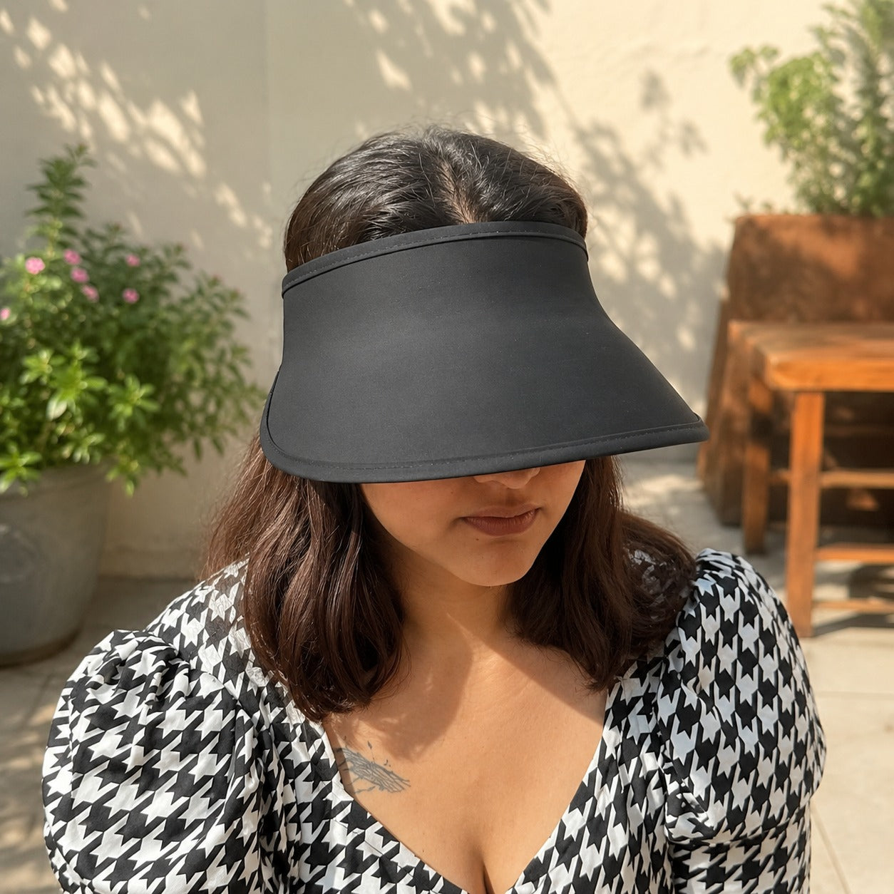 Wukusy women's adjustable wide brim sun visor cap for outdoor summer use in random color, providing sun protection and stylish shade.