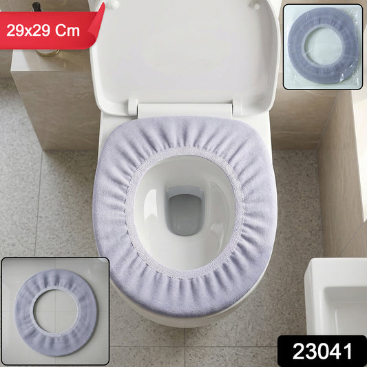 Soft fabric elastic toilet seat cover by Wukusy, fits 29x29 cm seats, with a plush, comfortable texture.
