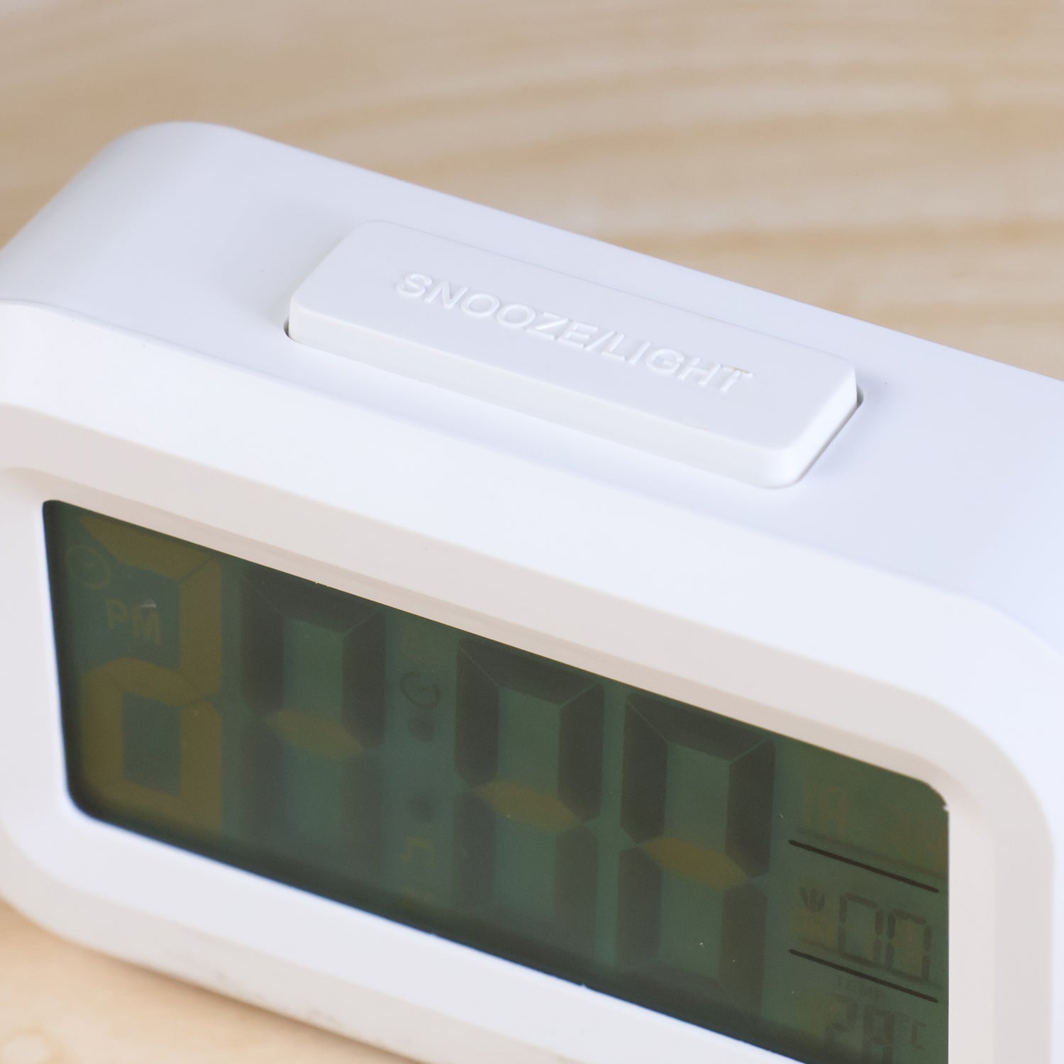 Wukusy Modern Digital LED Alarm Mini Clock showing time display with sleek black design for home use.