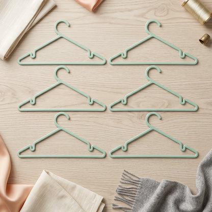 Set of six durable plastic Wukusy Apex Gripi cloth hangers for wardrobe organization, featuring sleek design and sturdy construction.