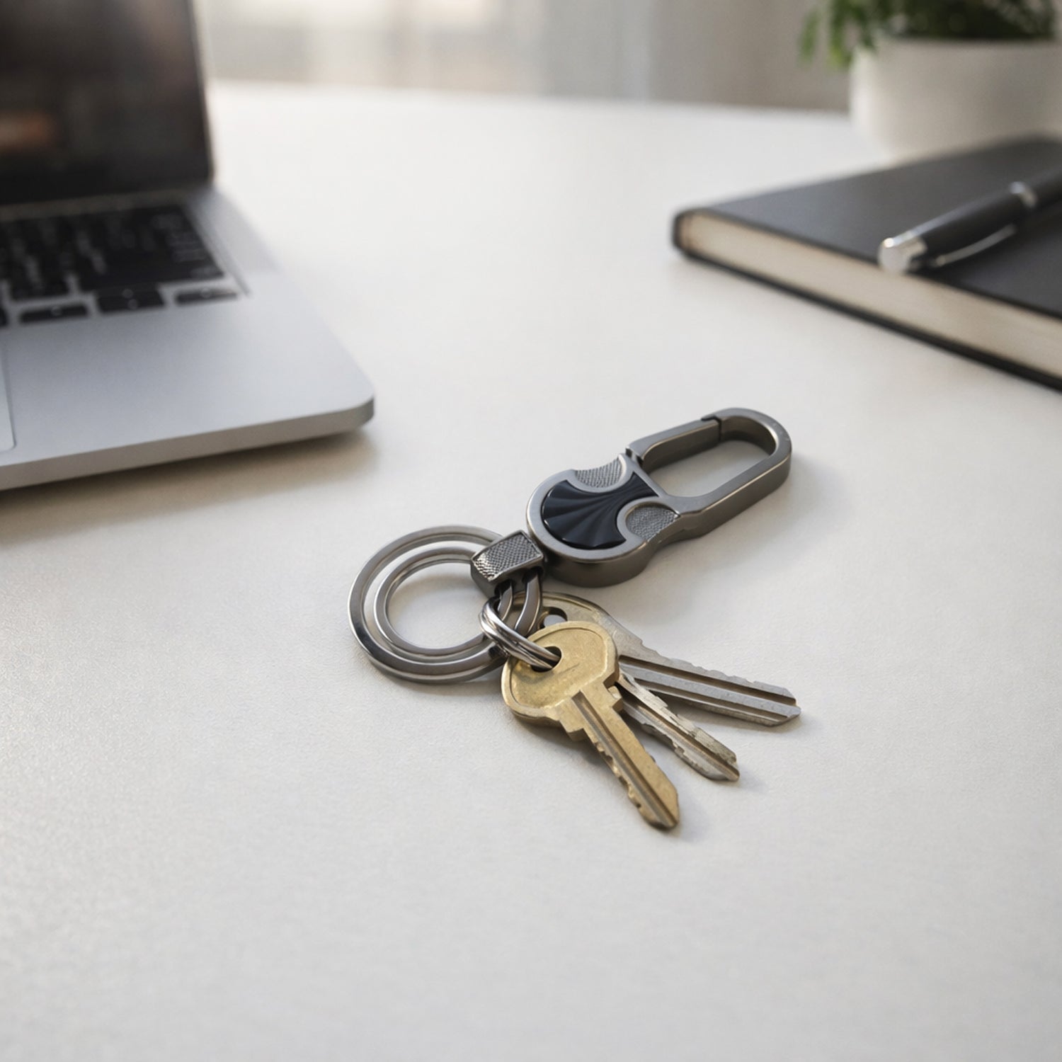 Wukusy premium metal key holder keychain with multiple hooks for organizing keys, displayed on a plain background.