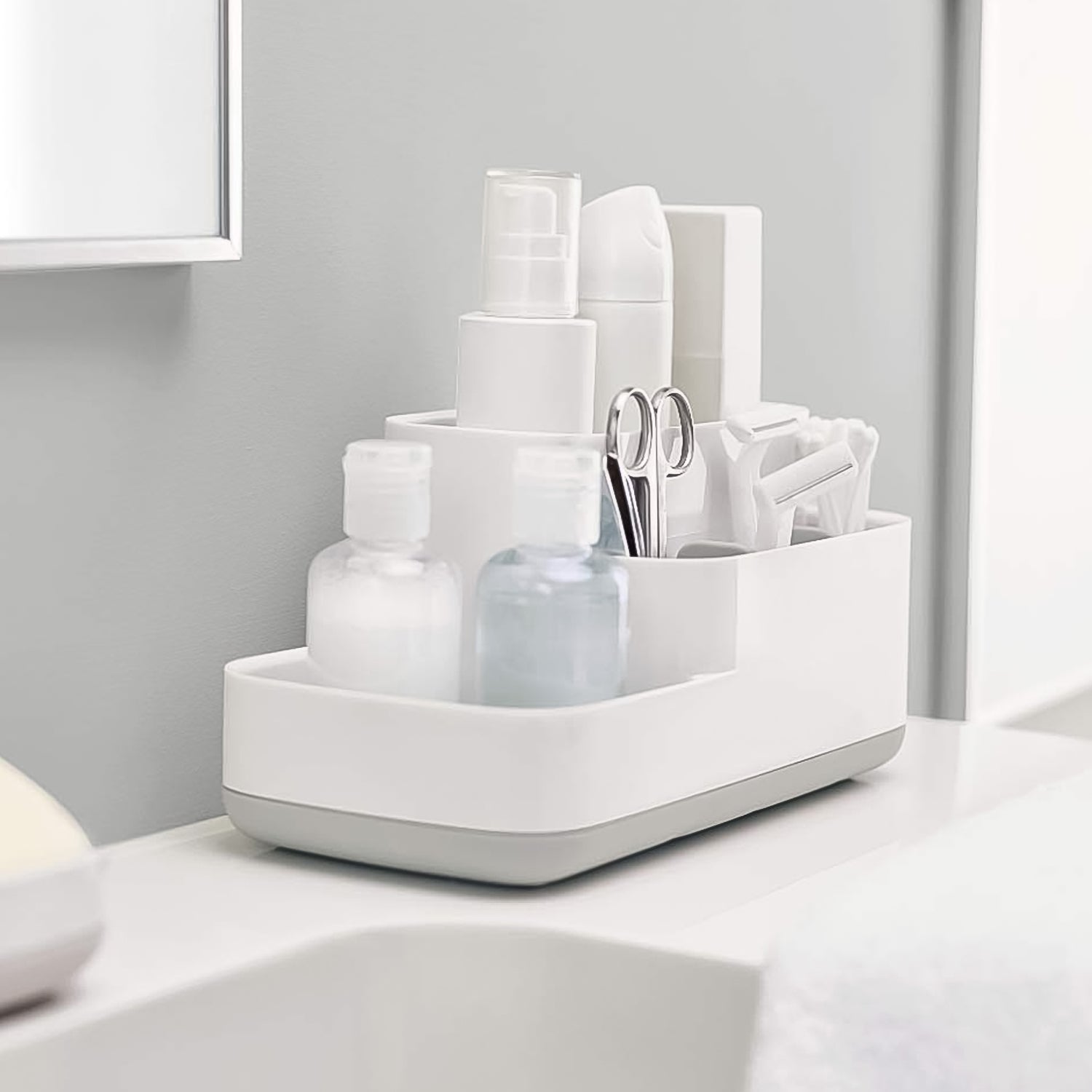 Wukusy plastic multipurpose bathroom and desk organizer with five compartments for storage and organization.