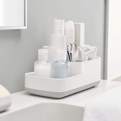 Wukusy plastic multipurpose bathroom and desk organizer with five compartments for storage and organization.