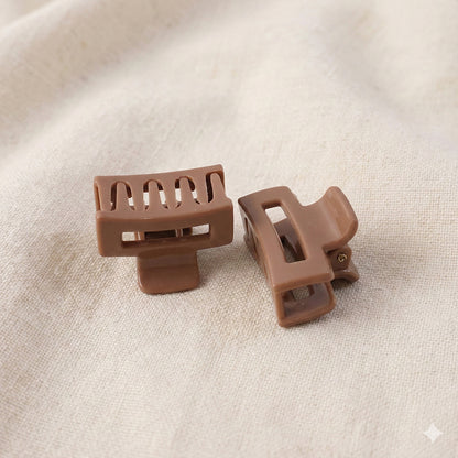 Set of six Wukusy mini hair claw clips in various colors, perfect for securing small sections of hair.