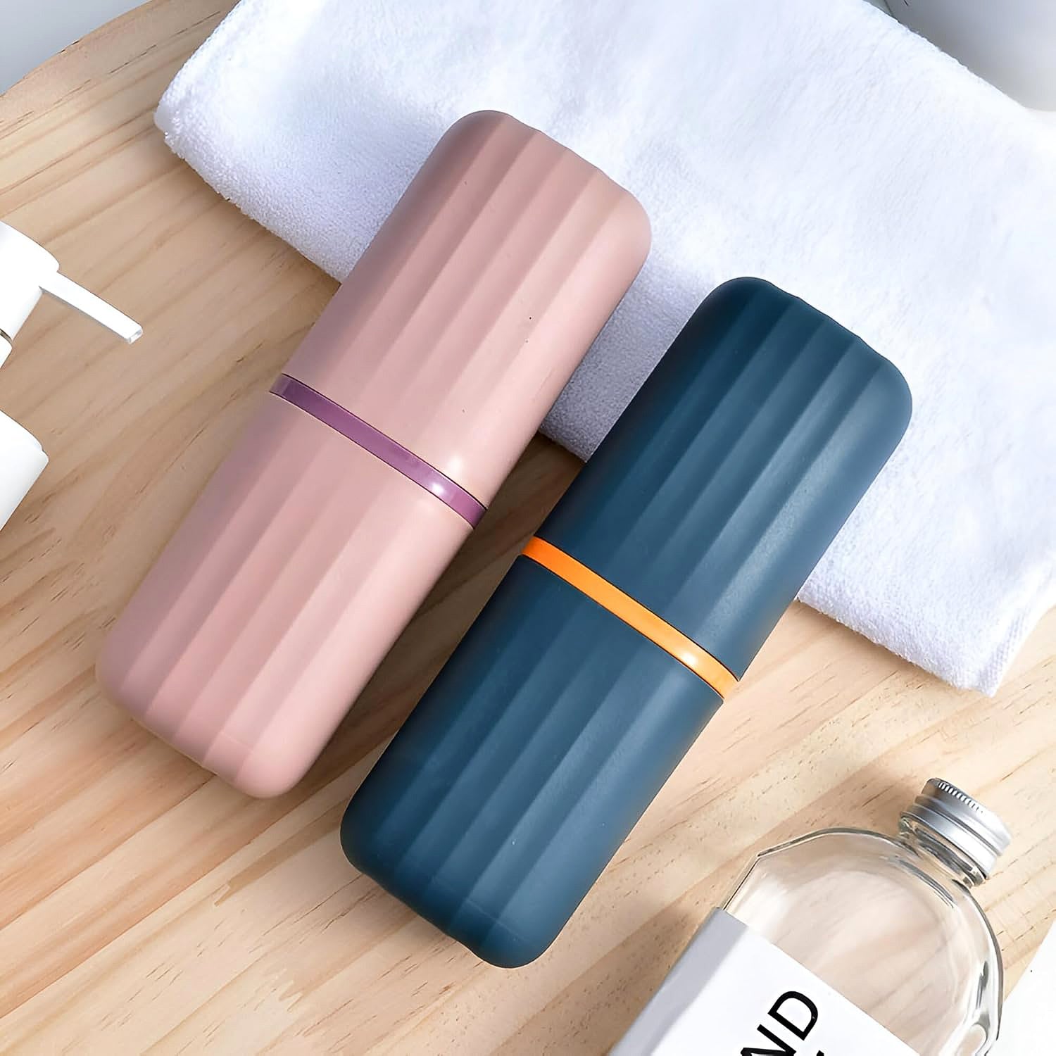 Wukusy plastic hygienic toothbrush travel case set with two portable, hygienic storage containers for toothbrushes.