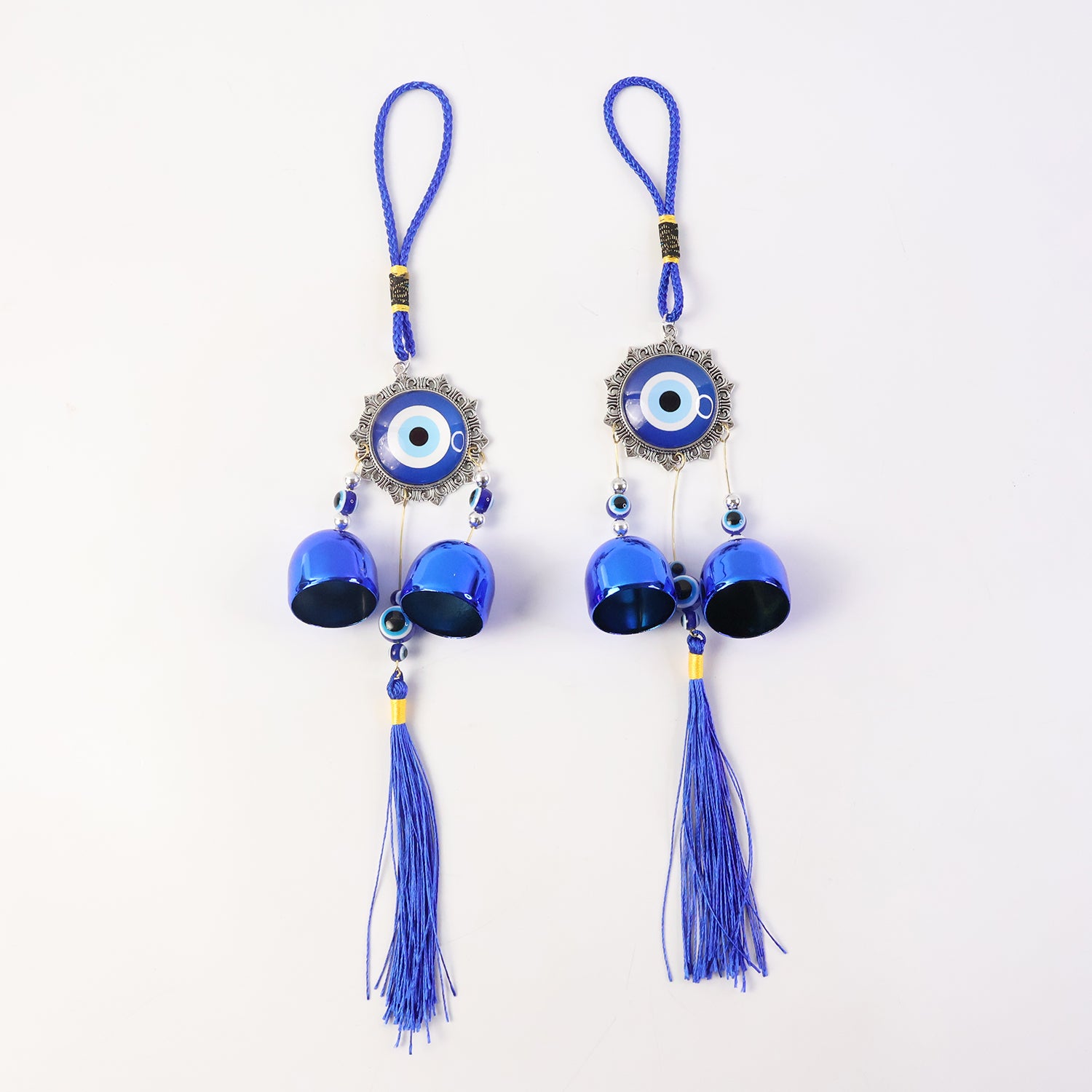 Decorative evil eye hanging wind chime set with two pieces by Wukusy, featuring colorful eye charms and metal chimes.