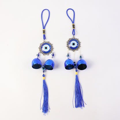 Decorative evil eye hanging wind chime set with two pieces by Wukusy, featuring colorful eye charms and metal chimes.