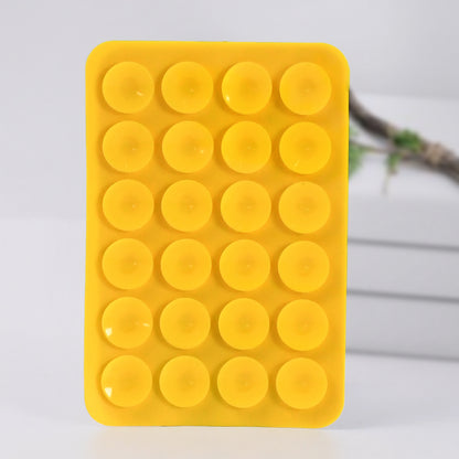 Wukusy suction phone case holder mount in mixed colors, versatile mobile accessory for hands-free phone use.
