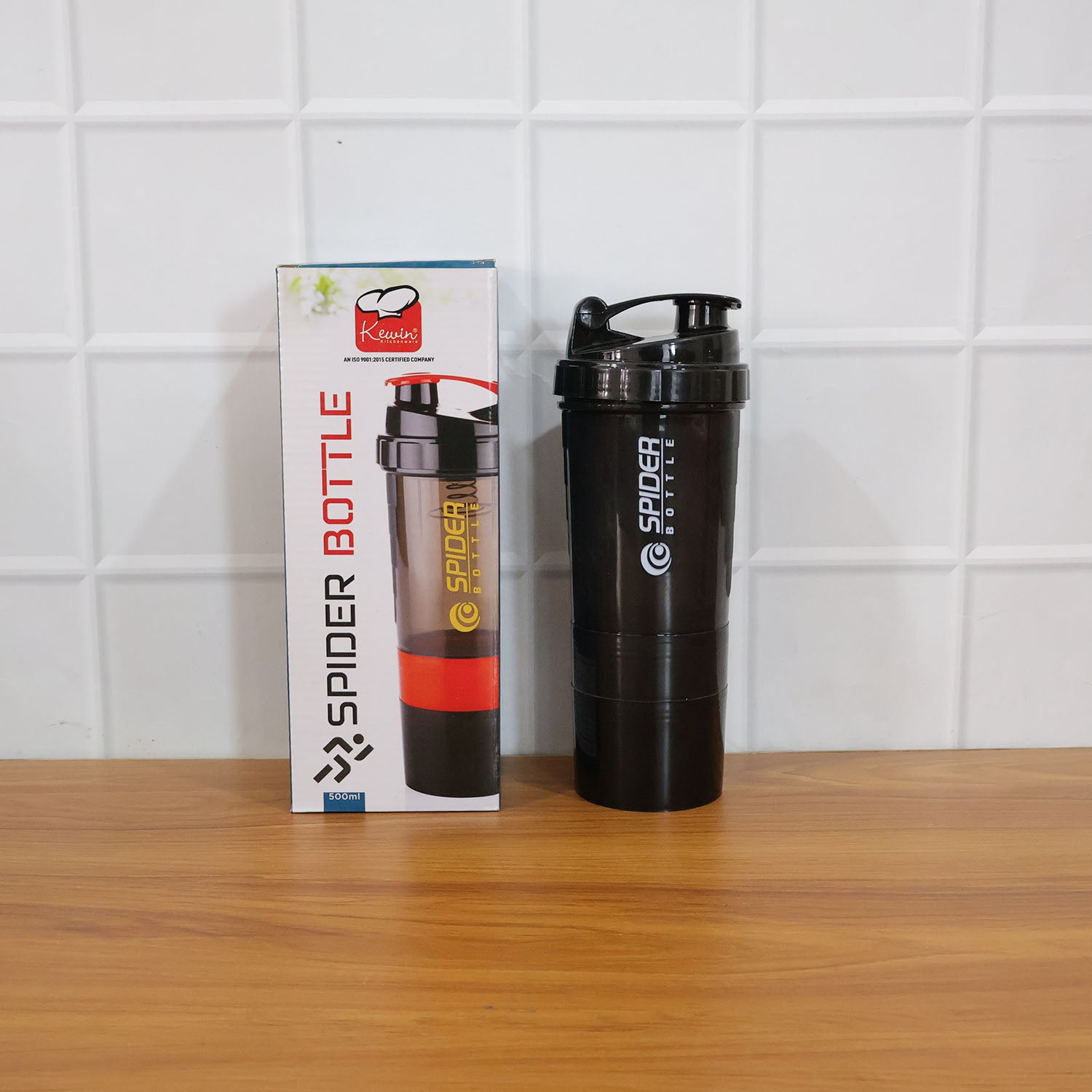Wukusy multipurpose protein shaker bottle, 500ml capacity with secure lid and mixing grid for smoothies and supplements.