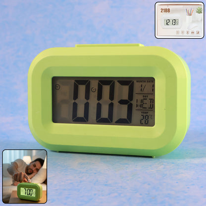 Digital alarm clock with clear LED display from Wukusy showing time and alarm settings on a sleek black device