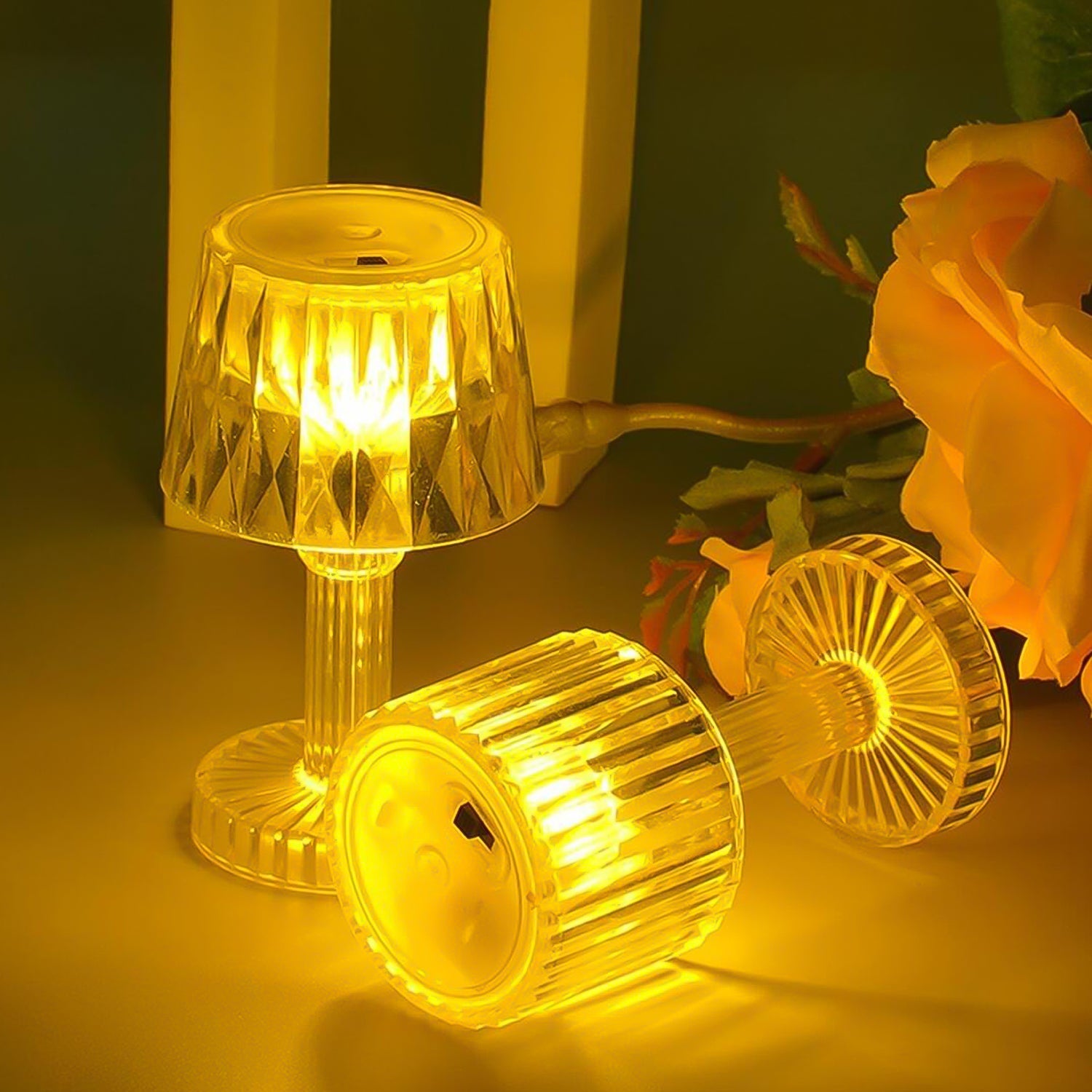 Wukusy portable LED candle lamp on a table, small plastic home improvement light, emits a warm, soft glow for cozy ambiance.