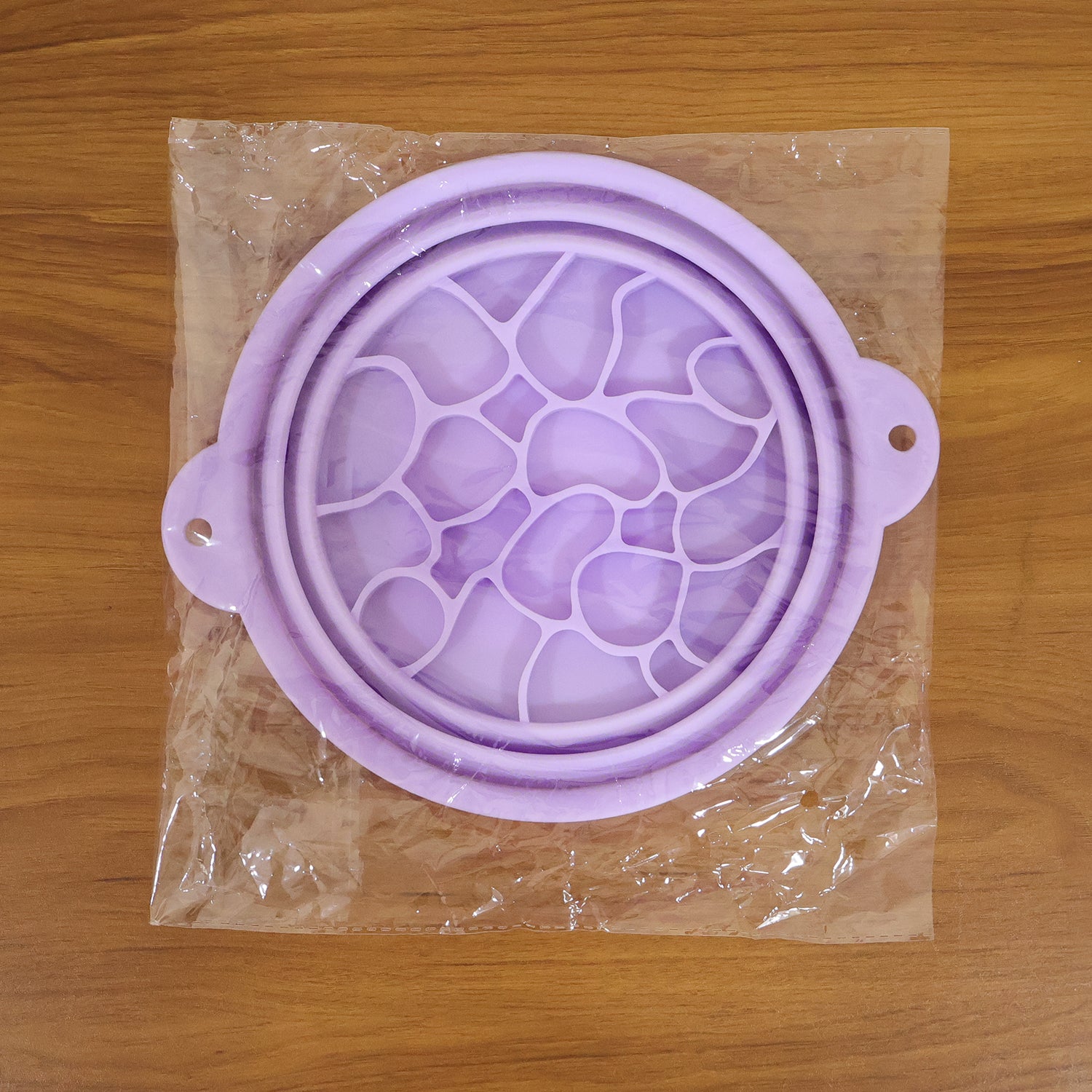 Wukusy folding silicone facial ice bath bowl shown open with smooth silicone surface, ideal for skincare and facial cooling treatments.