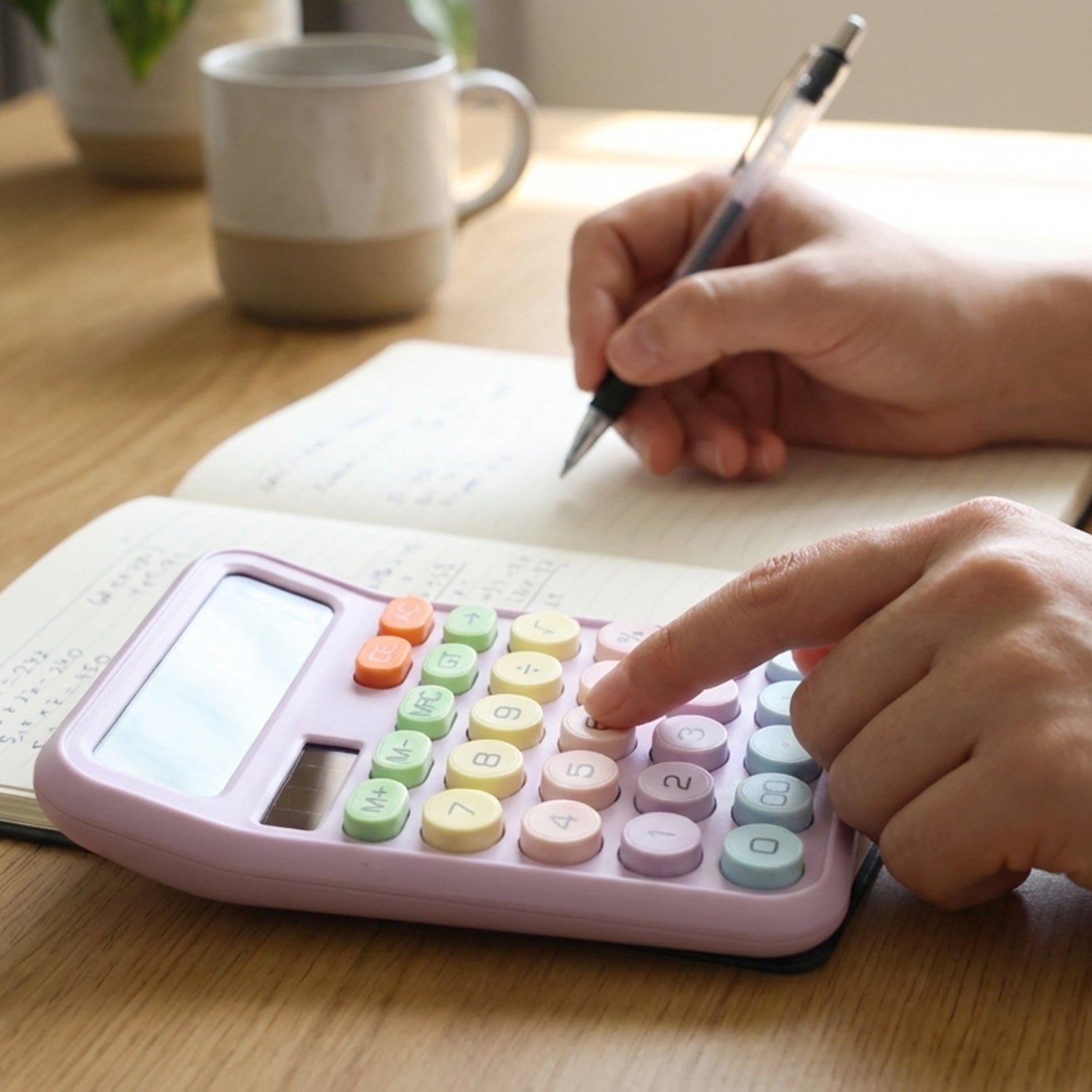 Wukusy electronic desktop calculator with numeric keypad and display screen, black and gray design for office use