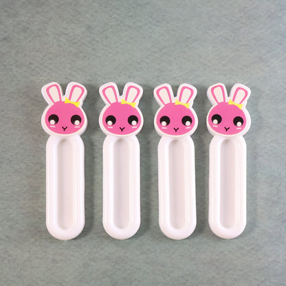 Set of four Wukusy Self Stick Push Pull Helpers for home and kitchen, designed to assist with opening doors and drawers.