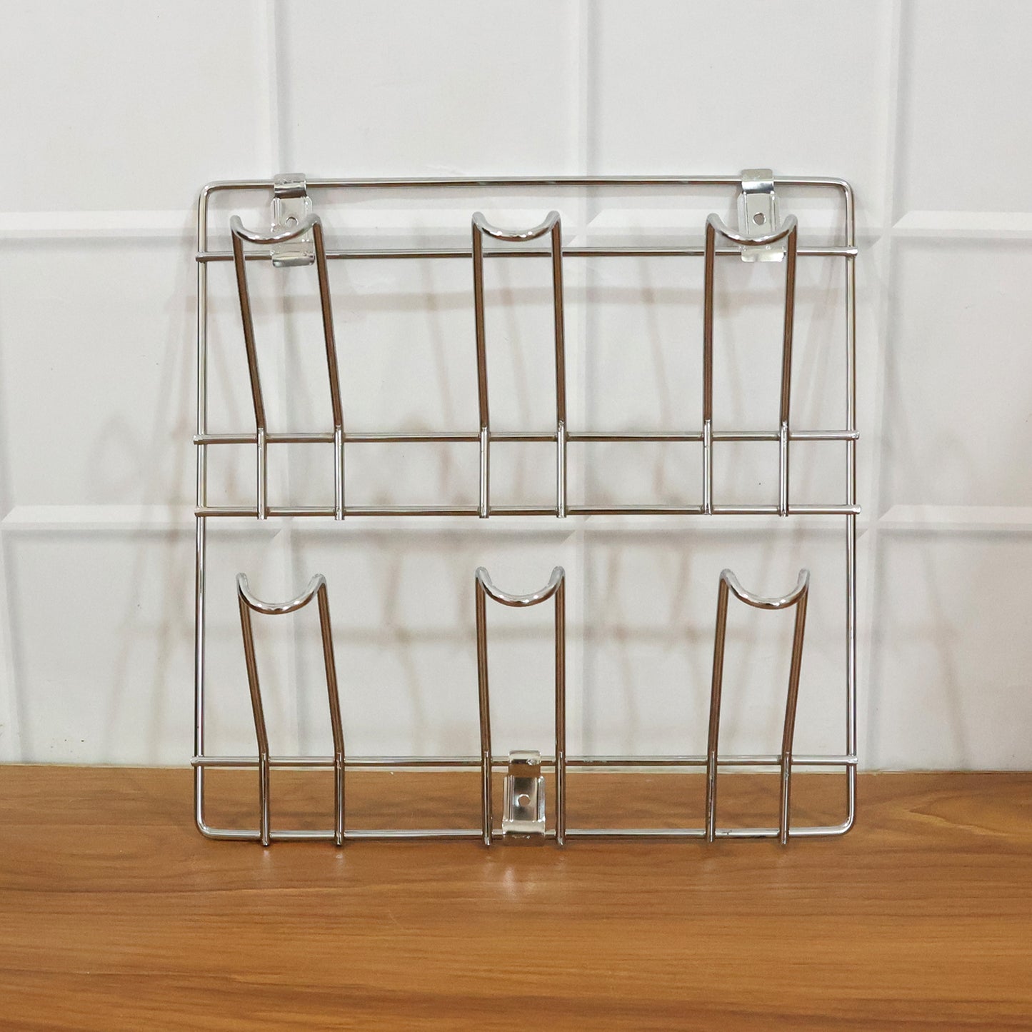 Wall-mounted stainless steel cup and mug holder rack by Wukusy, 25x25 cm, perfect for organizing kitchen or bathroom cups.
