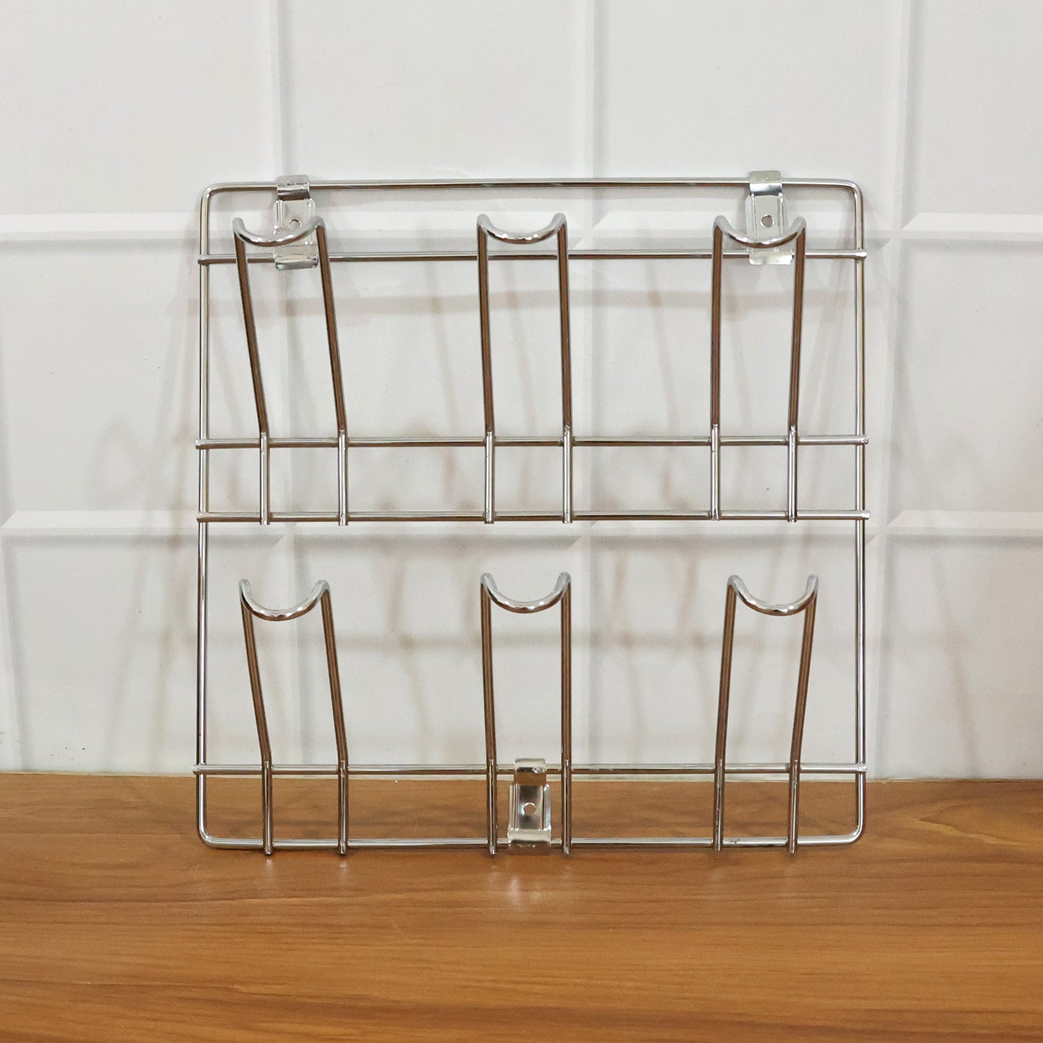 Wall-mounted stainless steel cup and mug holder rack by Wukusy, 25x25 cm, perfect for organizing kitchen or bathroom cups.