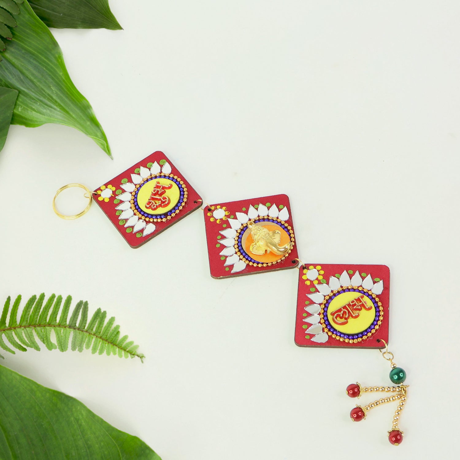 Decorative traditional Labh Shubh wall hanging by Wukusy, featuring intricate designs for home decor.