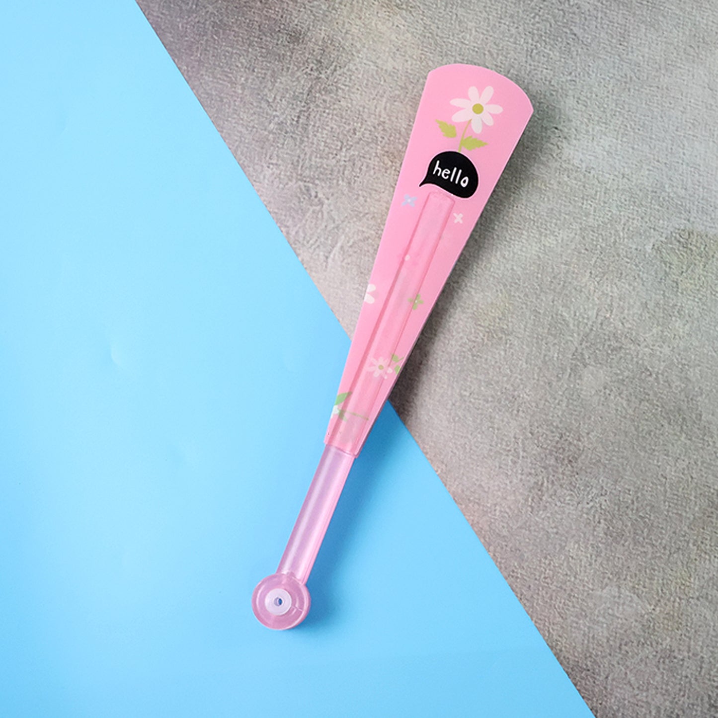 Foldable hand fan with floral print by Wukusy, featuring colorful flower designs on a lightweight, portable fan for personal use.
