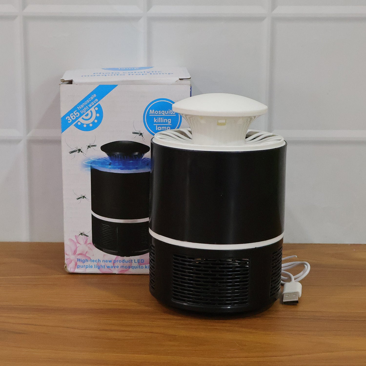 Wukusy USB-powered UV mosquito killer lamp with grid, designed to attract and trap mosquitoes indoors.