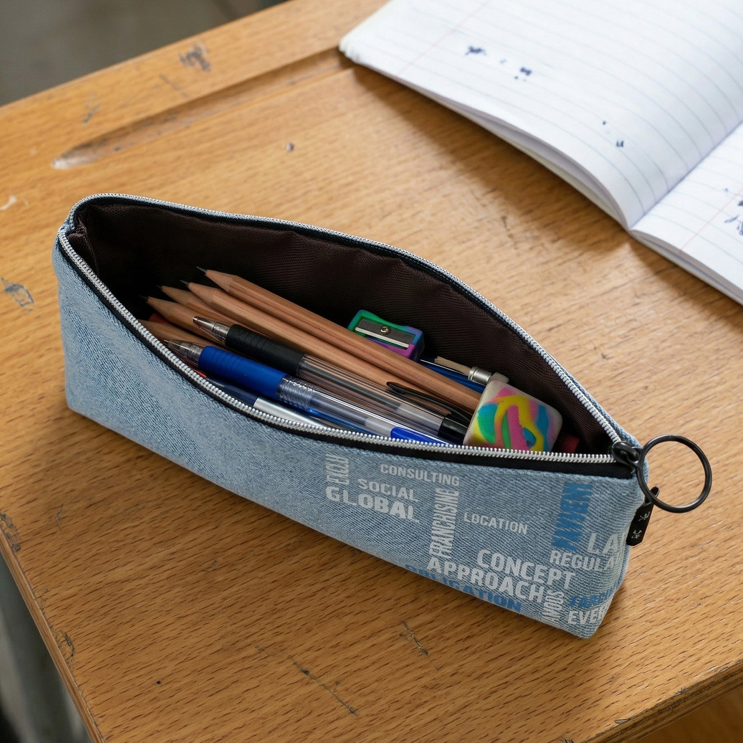 Wukusy fabric zipper pencil pouch with stylish design, compact storage for pencils and small stationery items.