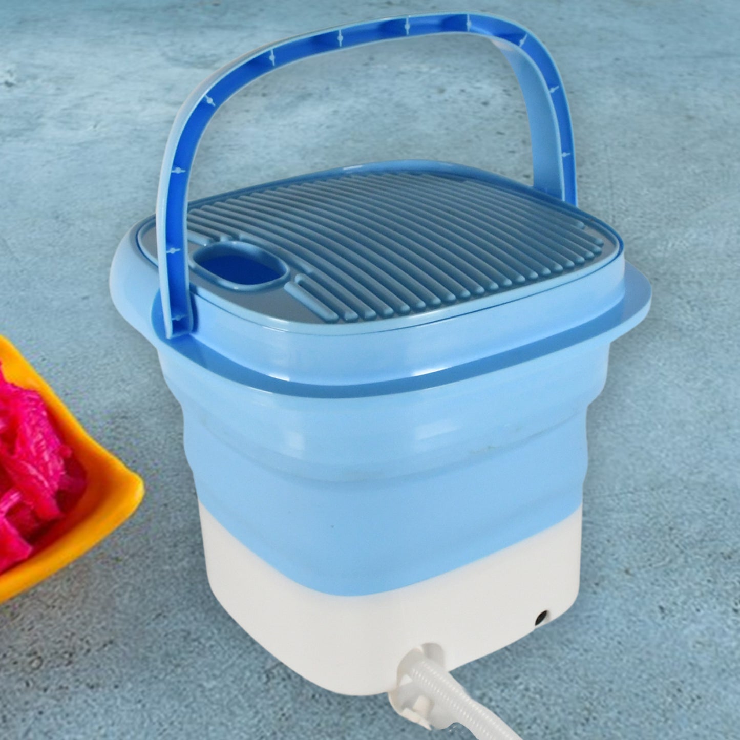 Wukusy portable mini folding washing machine for travel, camping, and small loads like underwear, socks, and baby clothes.