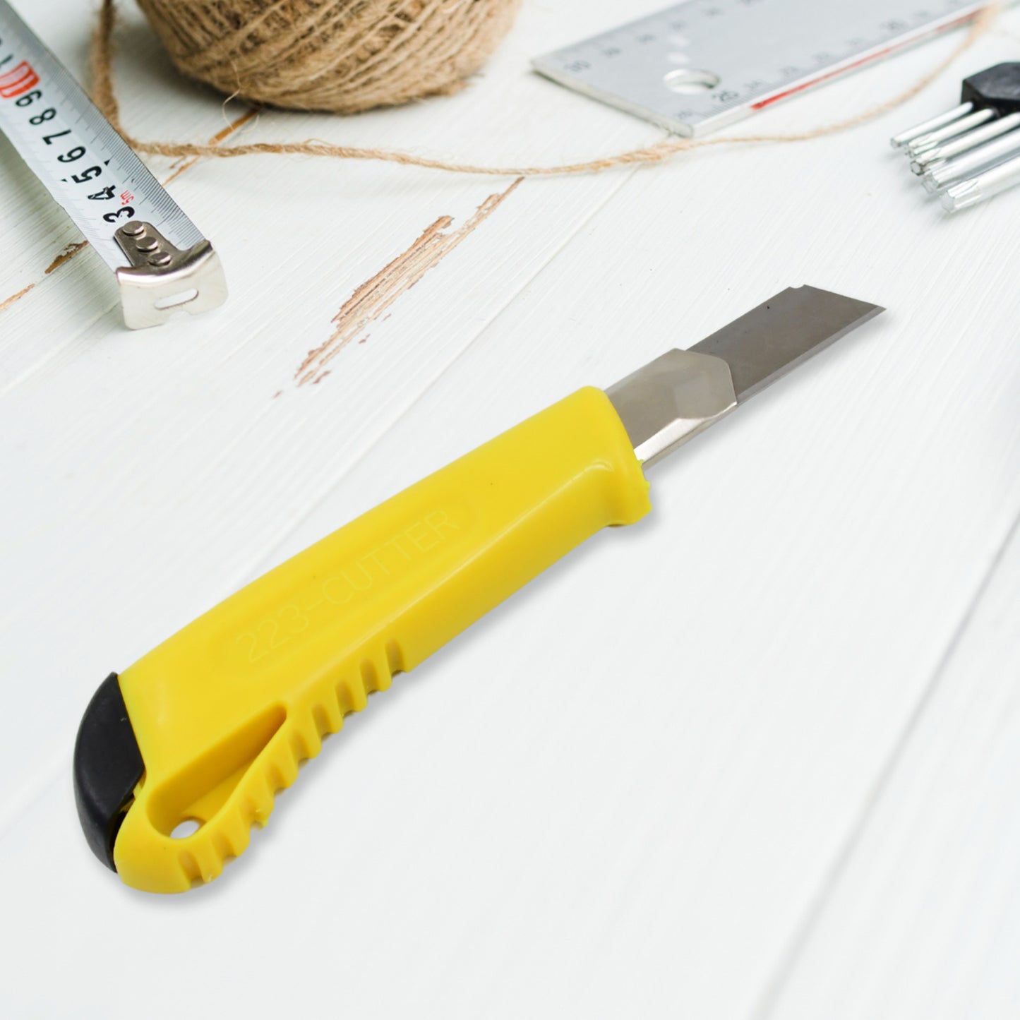Heavy duty Wukusy cutter knife for heavy-duty cutting tasks, featuring a sturdy metal handle and sharp blade.