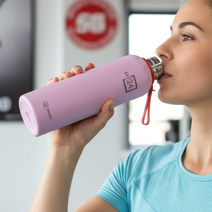 Wukusy Pexpo Bravo 1000ml stainless steel water bottle with vacuum insulation for hot and cold beverages, shown on a white background.