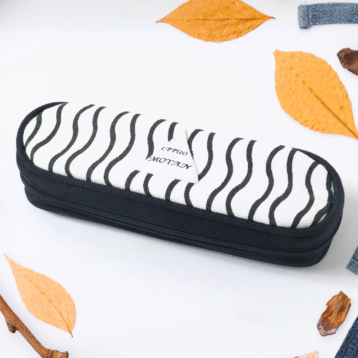 Wukusy premium fabric zipper pencil pouch with a sleek design, featuring a zipper closure and compact size for stationery storage.