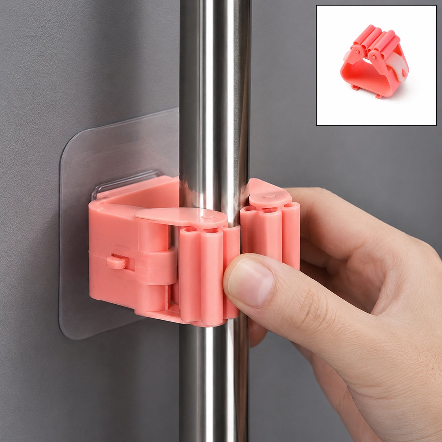 Wall-mounted plastic broom holder clip by Wukusy, designed for organizing mops and brooms in utility rooms or garages.