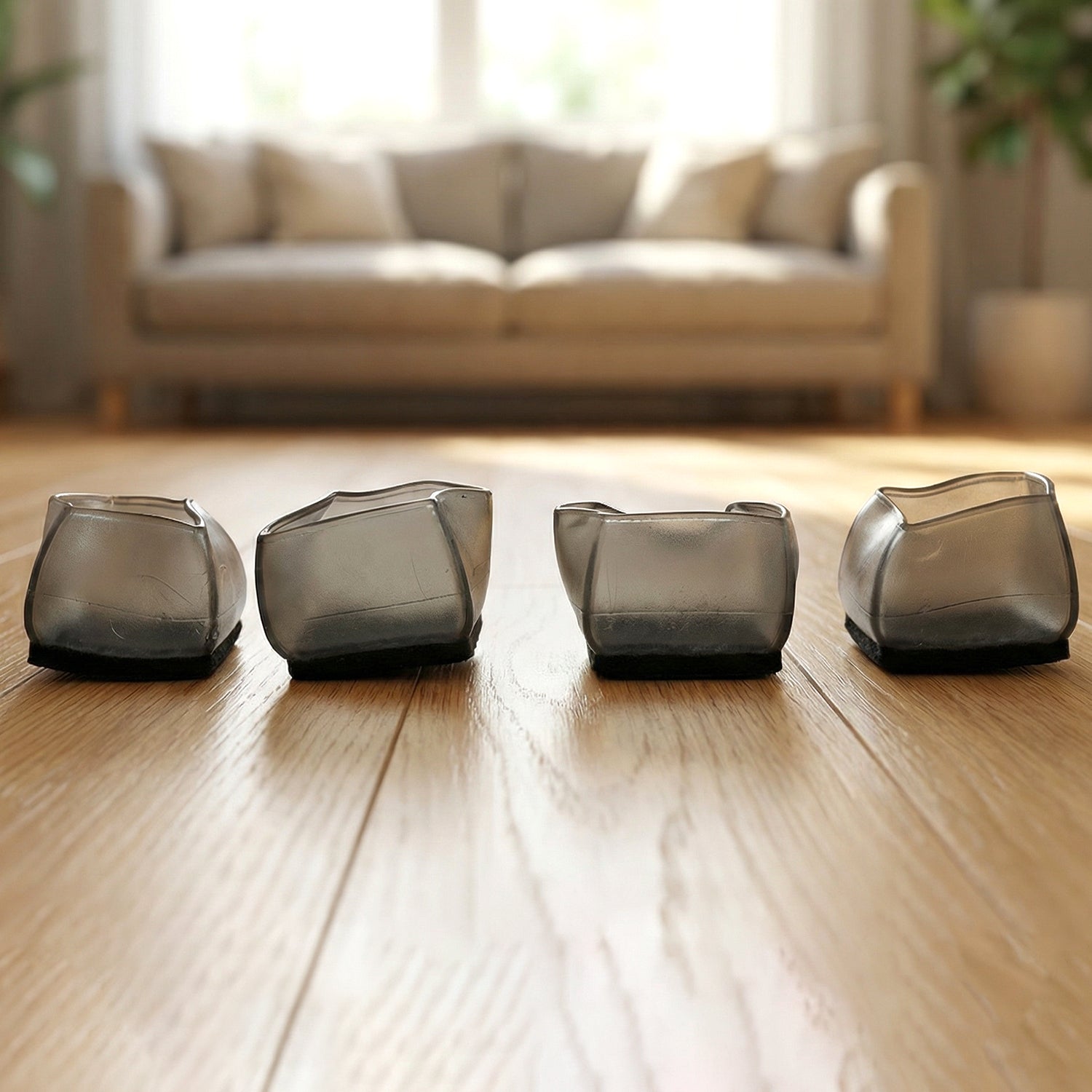Set of four Wukusy silicone furniture leg pads and covers for chairs, preventing scratches and noise on floors.