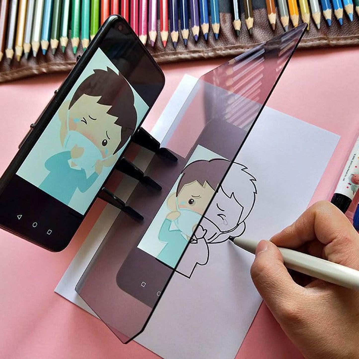 Wukusy Smart Mobile Phone Screen Drawing Projector Kit showing a compact device projecting drawings onto a surface with accessories.