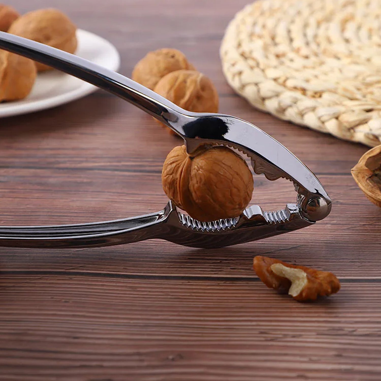 Wukusy 9357 small walnut cracker and nut cutter in stainless alloy, with open core design and portable walnut clamp plier.