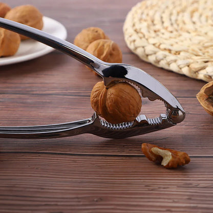 Wukusy 9357 small walnut cracker and nut cutter in stainless alloy, with open core design and portable walnut clamp plier.
