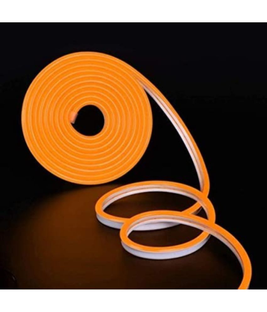 Orange Charkee Bluetooth speaker night light with music bulb, remote control, and glowing light for ambient illumination.